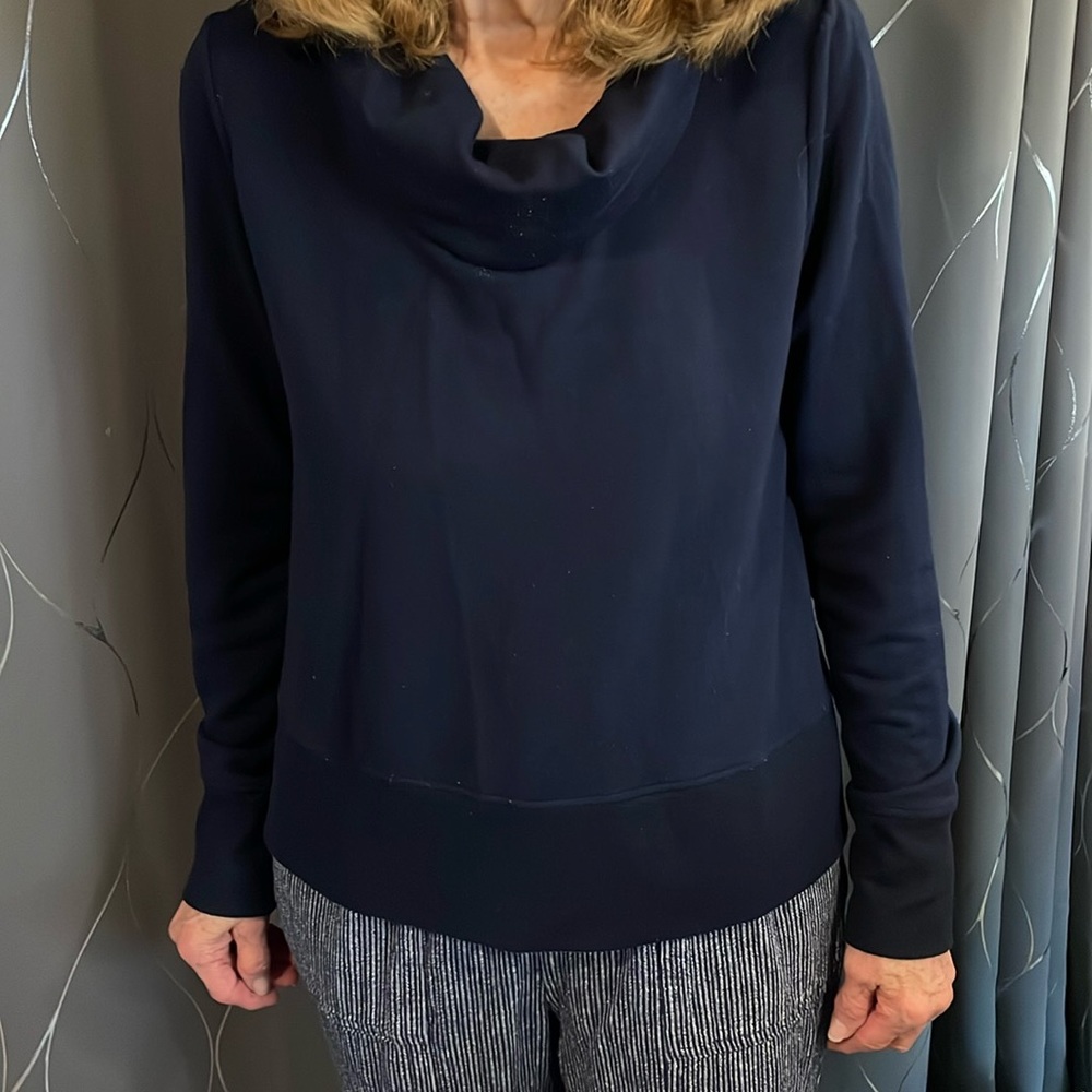 Women’s. Navy blue long sleeve top with a cowl neck size medium.